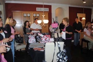 Attendees from the 2012 event with some of Thirty-One Gifts' items.
